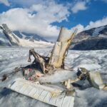 How much is climate change responsible for the release of bodies and wreckage in Alpine glaciers?